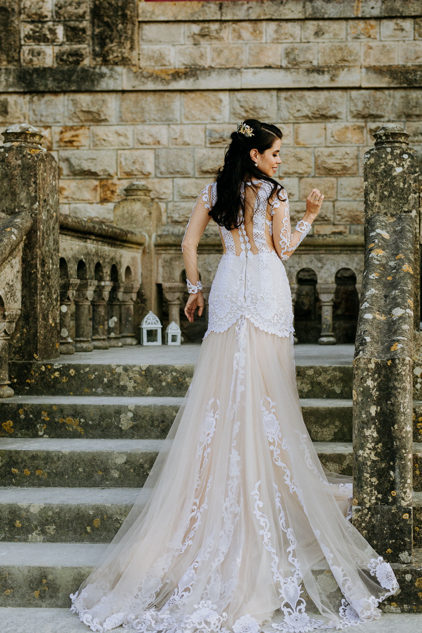 Bride in a dress with transparent details at Forte da Cruz